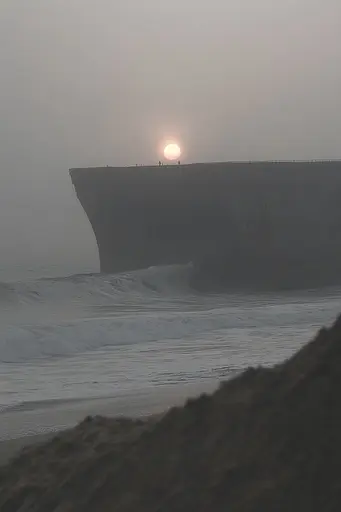 Midjourney generated image using SREF code Whispering Dusk: A large ship sitting on top of a beach next to the ocean.