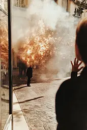 Midjourney generated image using SREF code Rustlight: A man standing in front of a fire on a city street.
