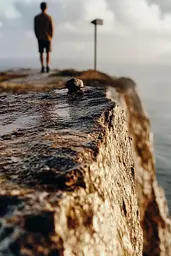 Midjourney generated image using SREF code Rustlight: A man standing on the edge of a cliff overlooking the ocean.