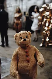Midjourney generated image using SREF code Rustlight: A teddy bear standing in front of a group of people.
