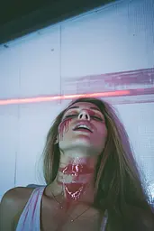 Midjourney generated image using SREF code Cyan Flux: A woman with blood on her face and neck.