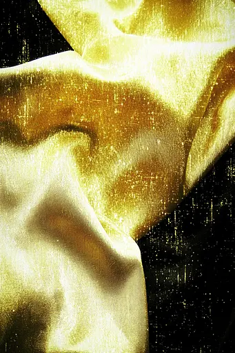 Midjourney generated image using SREF code Coalpaper: A close up of a gold fabric on a black background.