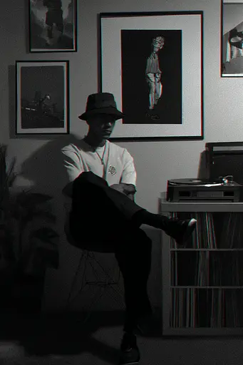 Midjourney generated image using SREF code Opaque Lenses: A man sitting on a chair in front of a record player.