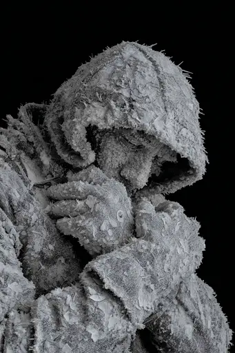 Midjourney generated image using SREF code Squelchloom: A black and white photo of a person wrapped in a blanket.