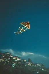 Midjourney generated image using SREF code Blue Velvet: A colorful kite flying in the sky over a city.