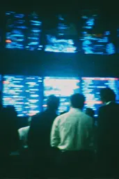 Midjourney generated image using SREF code Blue Velvet: A group of people standing in front of a large screen.