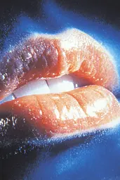 Midjourney generated image using SREF code Phosplasm: A close up of a woman's lips on a blue background.