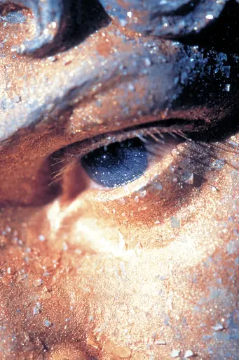 Midjourney generated image using SREF code Phosplasm: A close up of a woman's face covered in glitter.