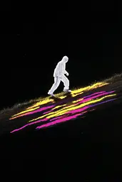 Midjourney generated image using SREF code Glyphfizz: A person walking on a grassy hill at night. 