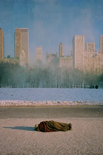 Midjourney generated image using SREF code Hushed Loomlight: A person laying on the ground in front of a city skyline.