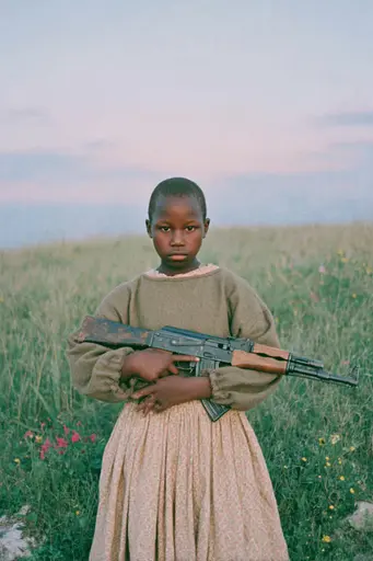 Midjourney generated image using SREF code Hushed Loomlight: A young girl holding a rifle in a field.