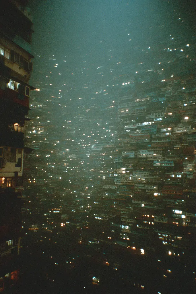 Midjourney generated image using SREF code Glitchmorose: A view of a city at night from the top of a building.