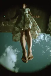 Midjourney generated image using SREF code Glitchmorose: A woman in a white dress is floating in the air.