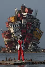Midjourney generated image using SREF code Pyrognome: A man in a polka dot suit and hat standing on a pier.