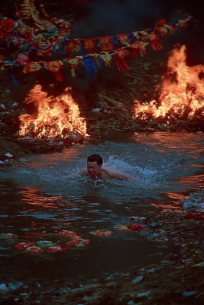 Midjourney generated image using SREF code Plushgrim: A man swimming in a body of water next to a fire.