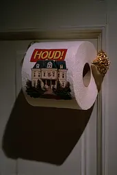 Midjourney generated image using SREF code Plushgrim: A roll of toilet paper with a picture of a house on it.