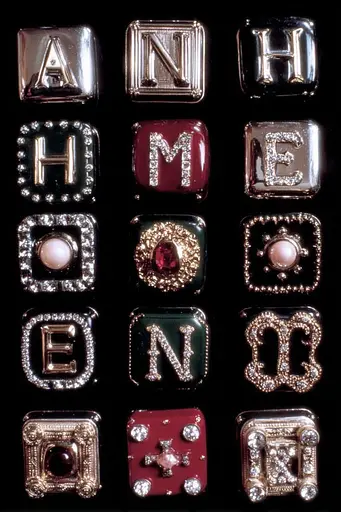 Midjourney generated image using SREF code GlimmerDial: A bunch of different colored buttons with rhinestones on them.