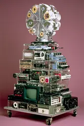 Midjourney generated image using SREF code GlimmerDial: A stack of electronics sitting on top of each other.