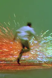Midjourney generated image using SREF code Chromoshred: A man in a white shirt is running through the water.