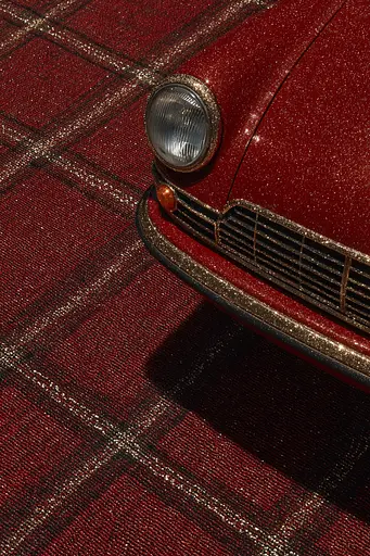 Midjourney generated image using SREF code Opaque Emberlock: A close up of the front end of a red car.