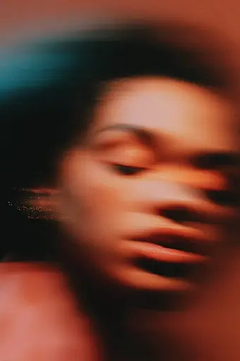 Midjourney generated image using SREF code Blurloom: a close up of a person with their eyes closed