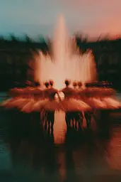 Midjourney generated image using SREF code Blurloom: A group of ballet dancers standing in front of a fountain.