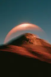 Midjourney generated image using SREF code Blurloom: A view of a red planet with a blue sky in the background.