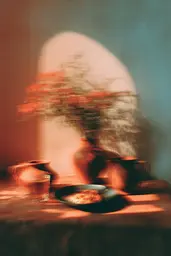Midjourney generated image using SREF code Blurloom: A plate of food sitting on top of a table.