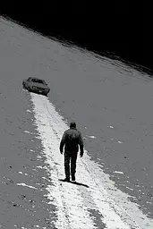 Midjourney generated image using SREF code Monoloom: A man walking down a snow covered road next to a car.