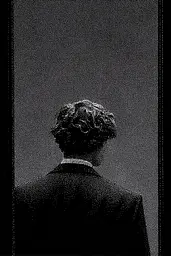 Midjourney generated image using SREF code Monoloom: A black and white photo of a man in a suit.