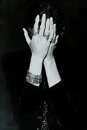 Midjourney generated image using SREF code Dark Reverence: A black and white photo of a woman covering her face with her hands.