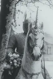 Midjourney generated image using SREF code Ethereal Dusk: A man in armor riding on the back of a white horse.