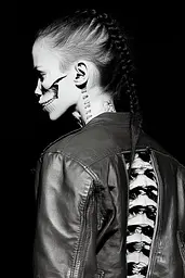 Midjourney generated image using SREF code Masked Void: A woman in a leather jacket with a skeleton on her back.