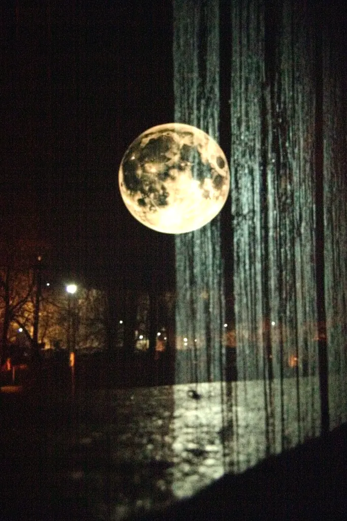 Midjourney generated image using SREF code Transient Reality: A full moon is reflected in the water of a fountain.