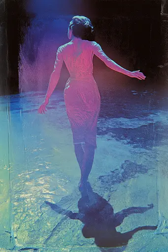 Midjourney generated image using SREF code Electric Dreams: A woman in a pink dress standing in the water.