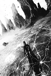 Midjourney generated image using SREF code Monochrome Shards: A black and white photo of a person standing in the middle of a desert.